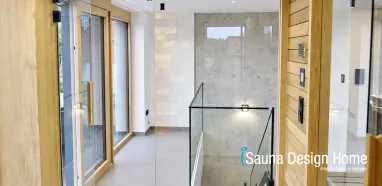 Exkluzív beltéri wellnessrészleg üvegezett szaunával Exkluzív beltéri wellnessrészleg üvegezett szaunával